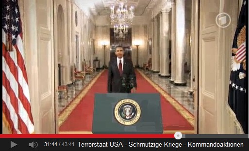 Der Massenm�rder Obama auf
                    dem roten Teppich, der Schwarze Hitler kommt...