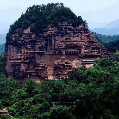 Hill of
Maijishan in China with Buddhist caves Hill of Maijishan
in China with Buddhist caves