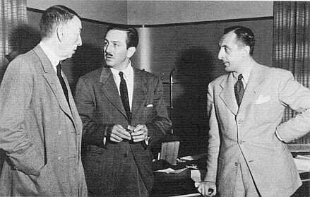 Walt Disney (middle)
                with Rachmaninoff (a composer) and Vladimir Horowitz (a
                pianist) 1942.