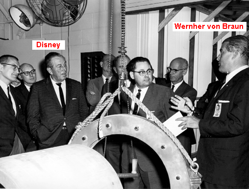 At 13 April 1965 Walt
                        Disney visits with his brother Roy and other
                        leading employees of the Disney company the
                        Marshall Center.