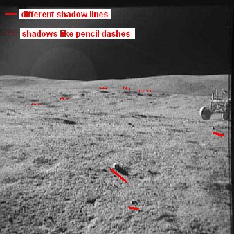 Apollo 16, photo no. AS16-109-17787:
                            Station 1, the "moon car" in the
                            stony desert, and chaos of shadows, and
                            there are shadows like pencil bars drawn
                            into the photo...