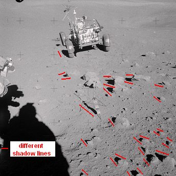 Apollo 16, photo no. AS16-109-17948:
                              Station 4, the "moon car" in the
                              stony desert, chaos of shadows