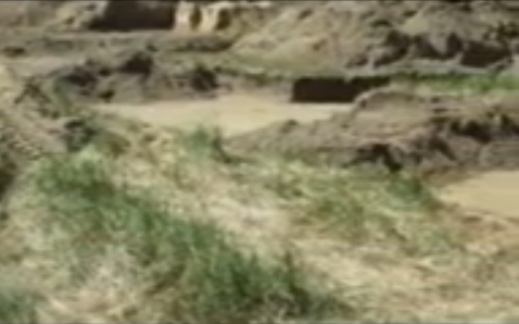 Prepared corpse pit / prepared mass
                            grave for murdered German prisoners of war
                            in summer 1945 02 (24min. 45sec.)