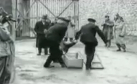 Murdered prisoner is put into a
                              coffin 02 (25min. 38sec.)