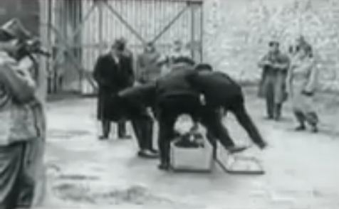 Murdered prisoner is put into a
                              coffin 03 (25min. 40sec.)