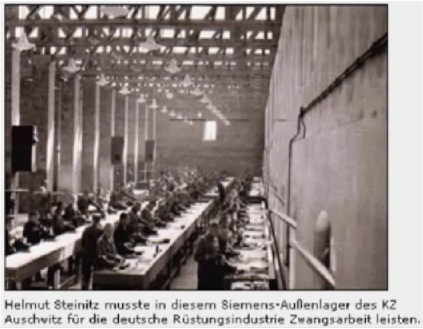 Concentration camp Auschwitz
                with factory, work hall with forced laborers for German
                armament industry