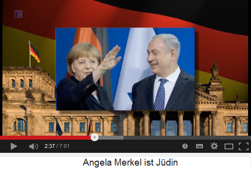 Frau [Moses-Fantasie]-Jdin Merkel mit
                            Hitler-Gruss mit
                            [Rothschild-Stern]-Israel-Fahne