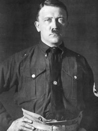 Hitler in a shirt with swastika
                              buttons, in 1925 appr.